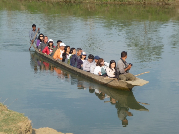 A canoe trip in crocodile infested waters of the Rapti, Chitwan, Nepal.